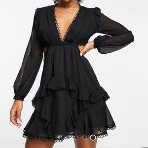 Black cut out long sleeve mini dress with trim